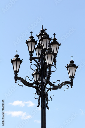 A bunch of lights with a cross