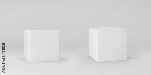 White 3d cubes set with perspective isolated on grey background. 3d modeling box with lighting and shadow. Realistic vector icon © janevasileva