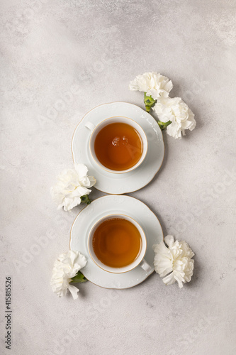 Two cups of tea for March 8th in flowers