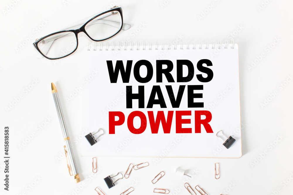 Notepad with inscriptions WORDS HAVE POWER on a white background. business concept. Notepad with inscriptions WORDS HAVE POWER on a white background. business concept.