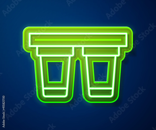 Glowing neon line Water filter icon isolated on blue background. System for filtration of water. Reverse osmosis system. Vector.