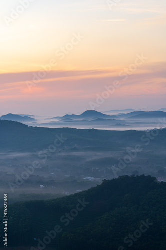 Morning in the mountains. Fog covering the mountain forests.