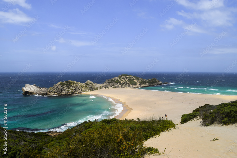 Strip of sand projecting from the shore into the sea in Robberg Nature Reserve, Plettenberg Bay, South Africa.