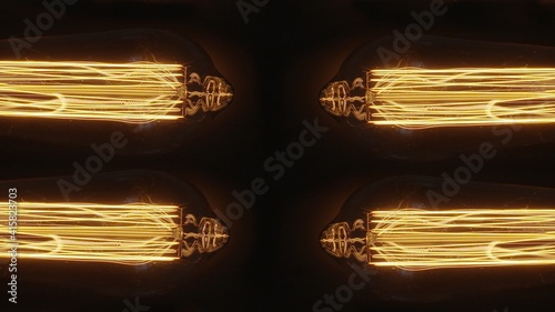 Cztery żarówki Edisona, ozdobne żarówki na ciemnym tle 