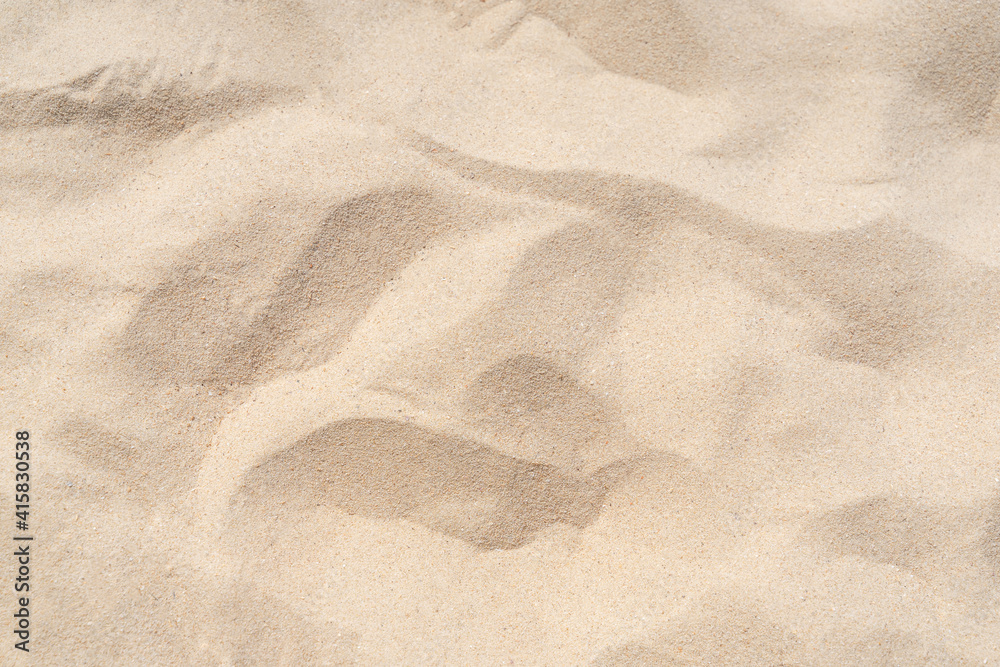 Naklejka premium Sand texture background. Brown desert pattern from tropical beach.