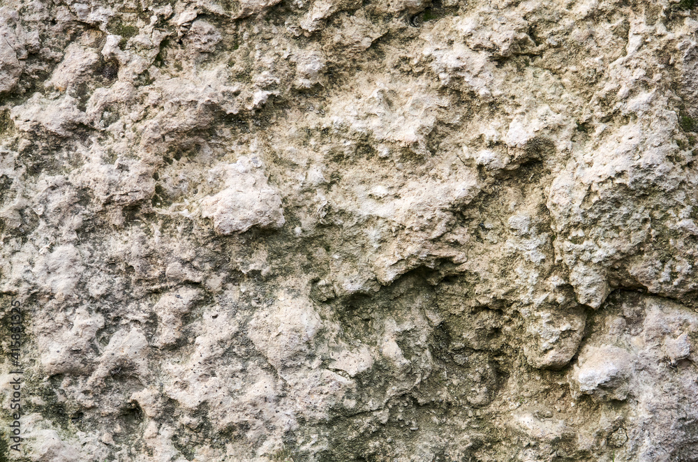 background, texture - gray hilly surface of a limestone rock