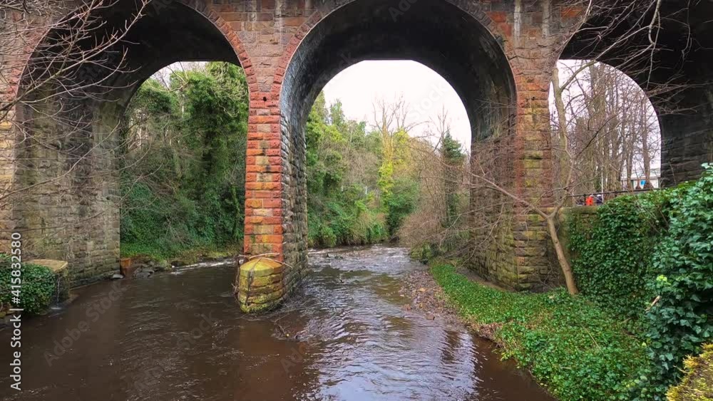 The old stone bridge in the countryside. Timelapse
