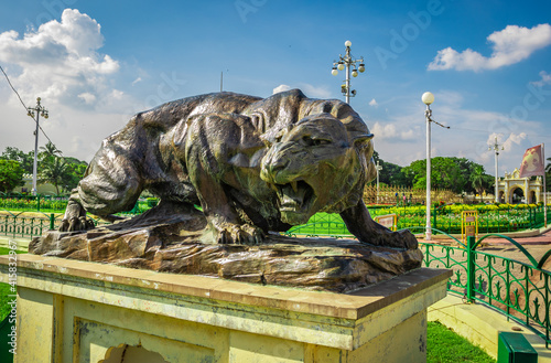 tiger statue with bright sky in background