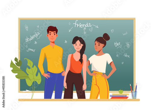 Smiling college students class group standing together in front of blackboard. Happy student team posing looking at viewer. Group of happy students. Group of people standing together in classroom
