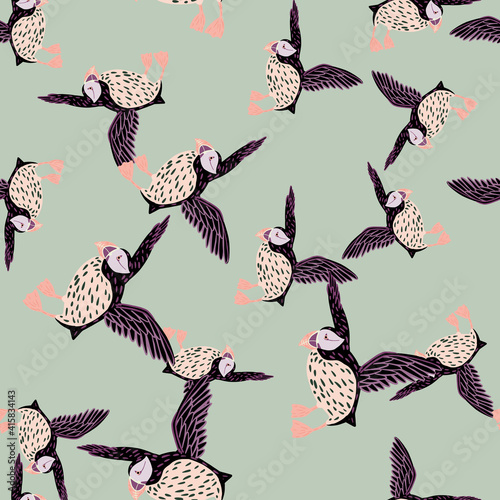 Ornithology seamless pattern with pale random puffin bird elements. Light blue background. Simple design.