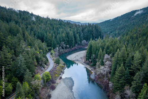 River winding through redwoods in Miranda, California photo
