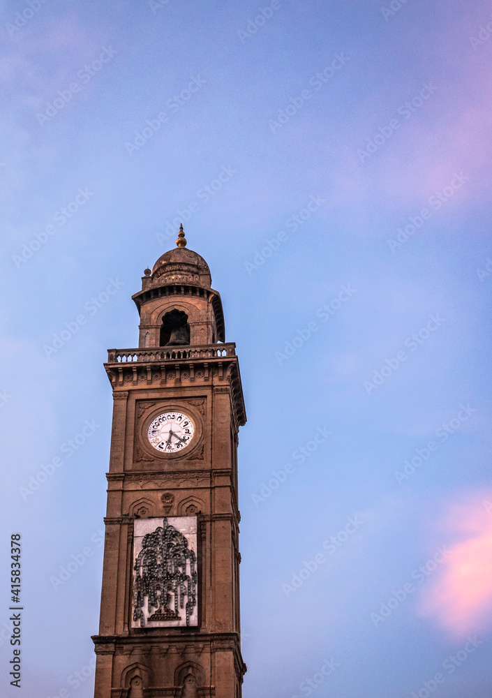 clock tower antique with blue sky and text space