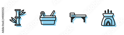 Set line Massage table, Bamboo, Sauna bucket and ladle and Aroma candle icon. Vector.
