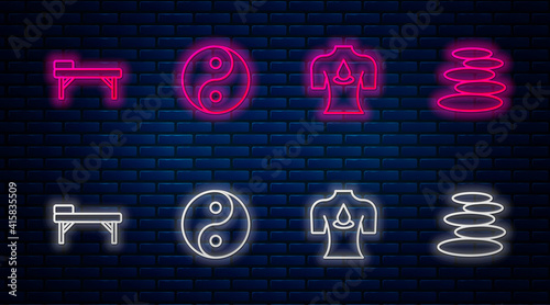 Set line Yin Yang, Massage with aroma oils, table and Stack hot stones. Glowing neon icon on brick wall. Vector.