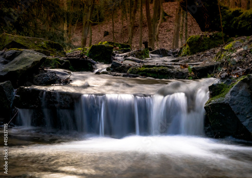 waterfall in autumn forest