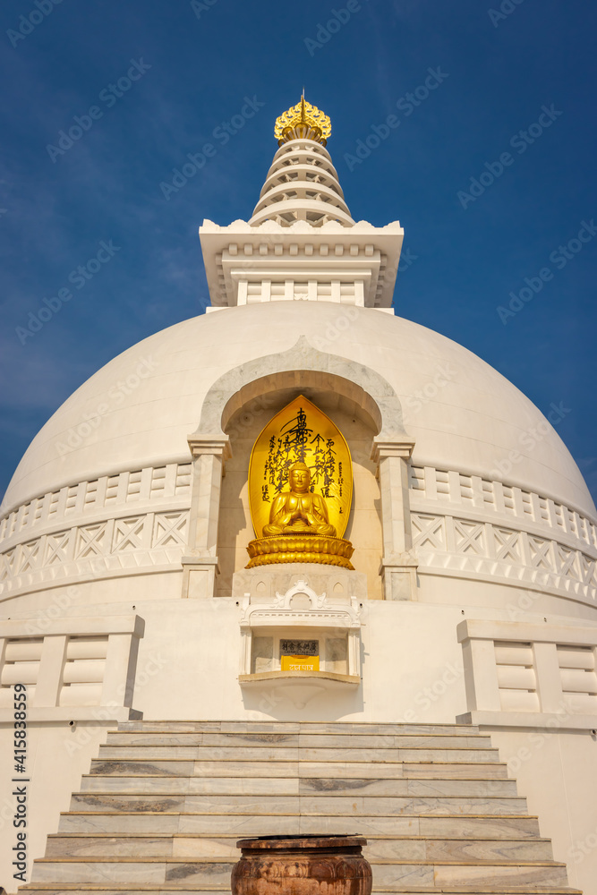 buddhist stupa isolated with amazing blue sky from unique perspective