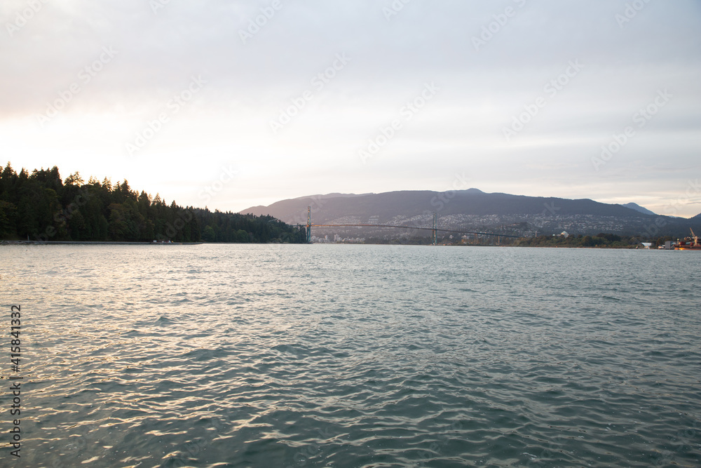 sunset over the lake Lions Gate Bridge Vancouver sunset over the lake Lions Gate Bridge Vancouver