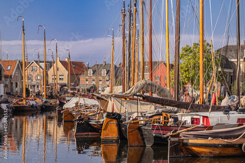 View of the harbor of the Dutch fishing village of Spakenburg in the former Zuiderzee with old traditional Botter fishing boats. photo