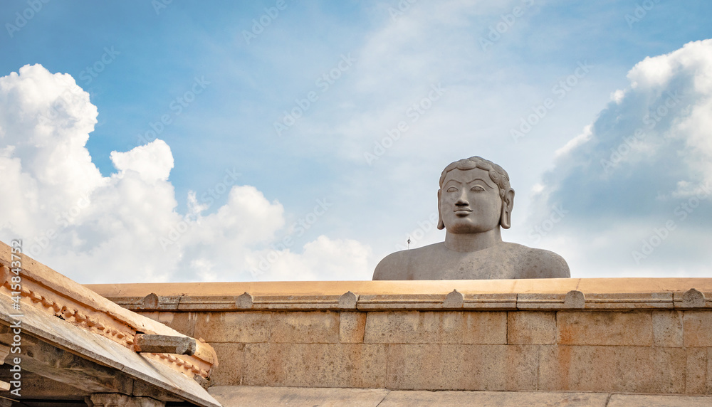 idol of a deity stone statue symbolizing Peace in Jainism with blue sky from different angles