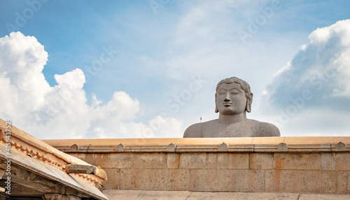 idol of a deity stone statue symbolizing Peace in Jainism with blue sky from different angles photo