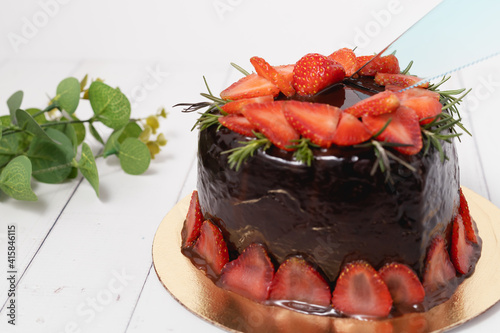 A plastic knife cutting ont...