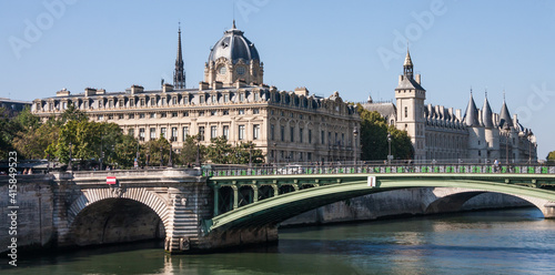 Panoramic landscape view of the Conciergerie  French Revolution Prison   Tribunal de Commerce  Commercial Court  and Notre Dame bridge over the Seine River in Paris  France