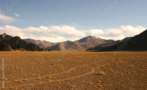 Panoramic view of high-altitude red desert on the Pamir Highway between Murghab and Ak Baital pass, Gorno-Badakshan, Tajikistan
