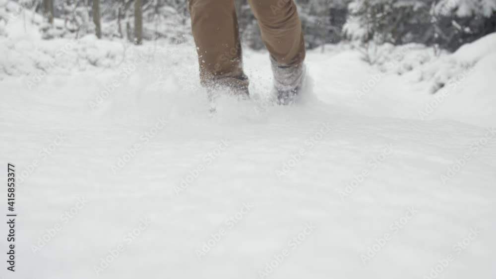 person walking in snow person walking in snow