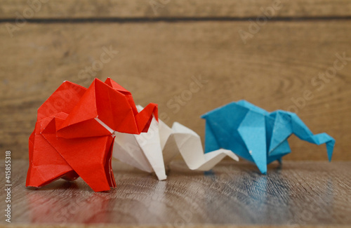 Folded colorful paper elephants decoration photo