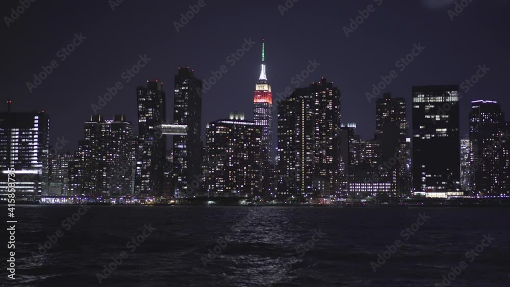 Wide shot of New York City skyline at night in Long Island 4k