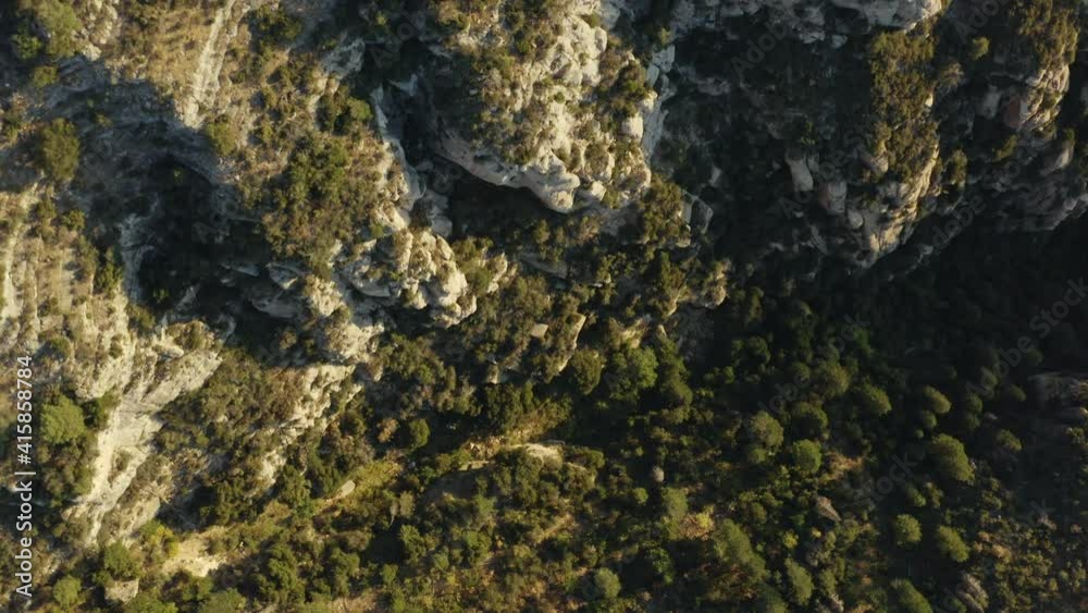 Aerial view over rocky mountains and forest, sunny day, in Arizona - top down, drone shot Aerial view over rocky mountains and forest, sunny day, in Arizona - top down, drone shot