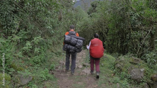 Couple road to vilcabamba, trail in middle of the forest, long trekking, peruvian jungle, archaeological road photo