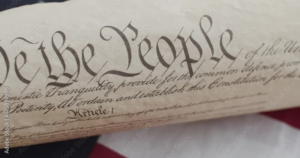 US constitution and US flag