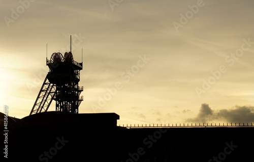 Förderturm der Zeche Westfalen in Ahlen, Kreis Warendorf. Aufnahme am Abend bei  untergehender Sonne. photo