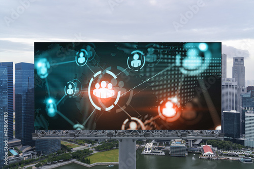 World planet Earth map hologram and social media icons on billboard over panorama city view of Singapore, Southeast Asia. The concept of people networking and connections.