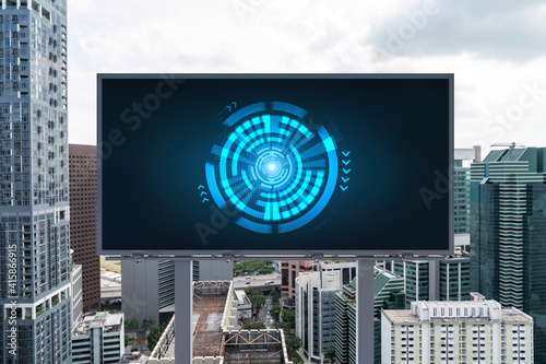 Technology hologram on billboard over panorama city view of Singapore. The largest tech hub in Southeast Asia. The concept of developing coding and high-tech science.