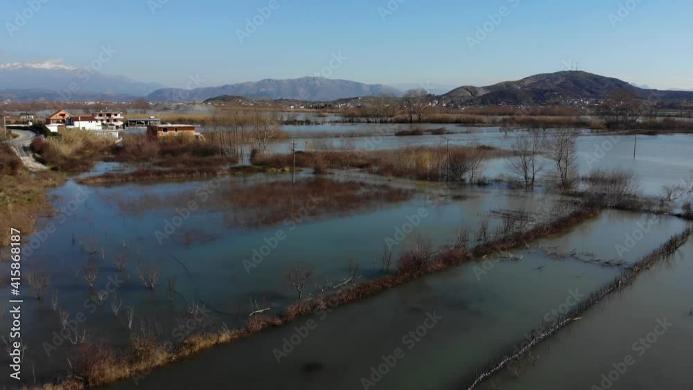 Large areas flooded by heavy rainfall near river in Shkodra, Albania Large areas flooded by heavy rainfall near river in Shkodra, Albania