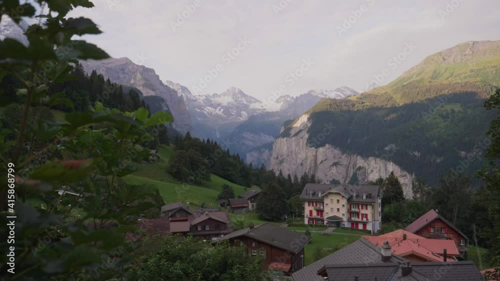 Cityscape of Wengen, Switzerland above the Lauterbrunnen Valley and with the Jungfraujoch in the background Cityscape of Wengen, Switzerland above the Lauterbrunnen Valley and with the Jungfraujoch in the background