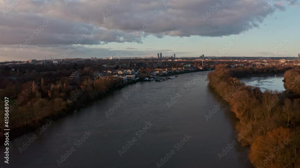 descending drone shot over river thames west London Chiswick sunset descending drone shot over river thames west London Chiswick sunset