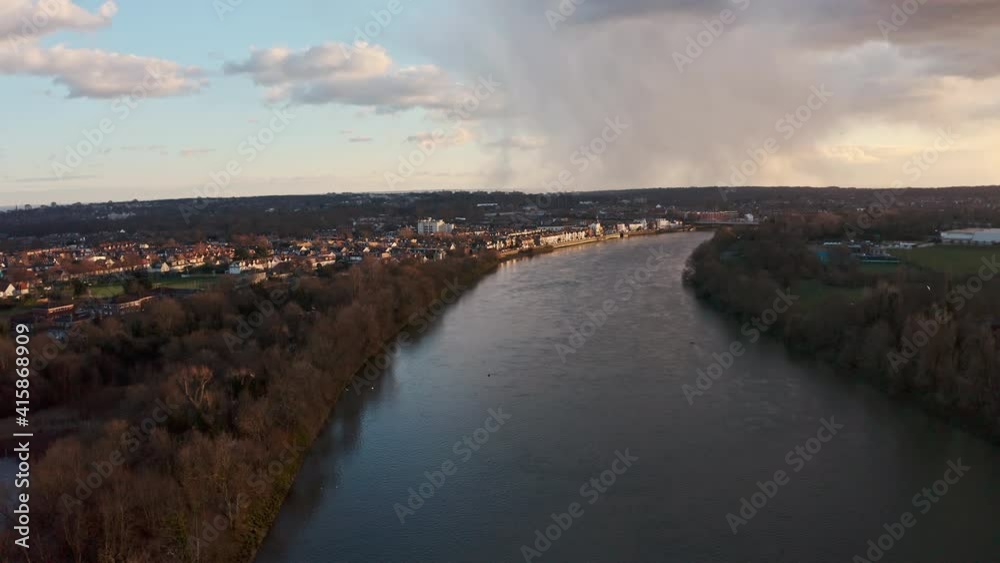 Dolly forward drone shot towards barnes bridge railway Lonsdale road river thames west London sunset Dolly forward drone shot towards barnes bridge railway Lonsdale road river thames west London sunset