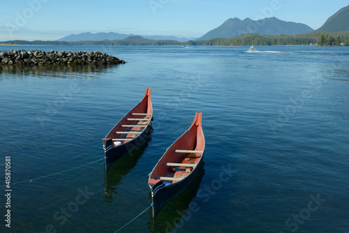 Photography Two native canoes anchored in Tofino Harbour.