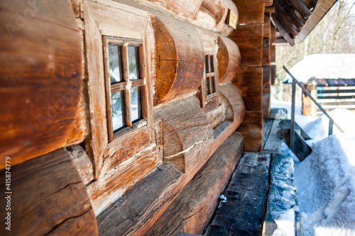 Old wooden background. Wooden log house texture © alipko