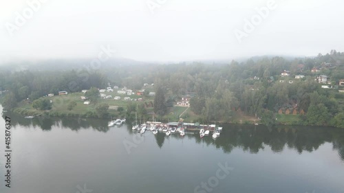 Beautiful River rapids in the fog in the morning. River water landscape. Flying from the drone through the morning fog over the river. Beautiful landscape. Forest river flow