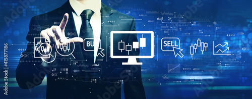 Stock trading theme with businessman on a dark blue background