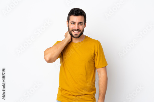 Young handsome man with beard isolated on white background laughing