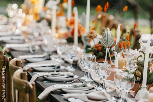 Fotografie Boho rustic modern guest table design, wedding ceremony outdoor, catering and or