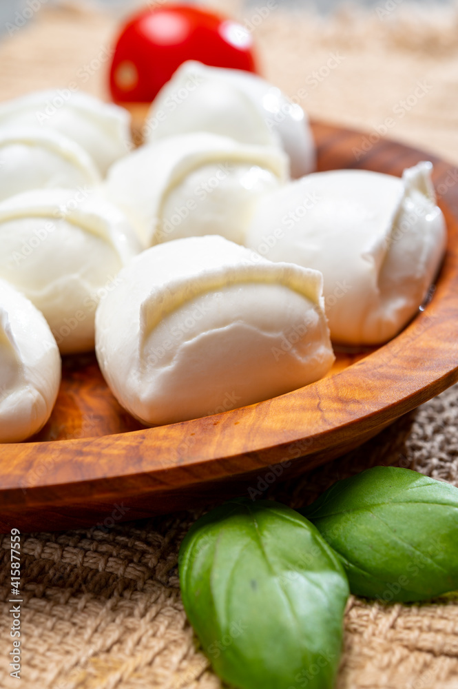 Tasty italian food, fresh white buffalo mozzarella soft cheese balls from Campania