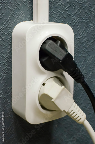 Electrical sockets on wall, close-up. photo