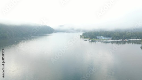 Beautiful River rapids in the fog in the morning. River water landscape. Flying from the drone through the morning fog over the river. Beautiful landscape. Forest river flow