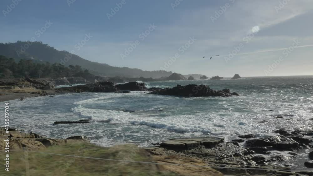 Slow motion from the fast car scenic landscapes of Big Sur coast of the pacific ocean Slow motion from the fast car scenic landscapes of Big Sur coast of the pacific ocean